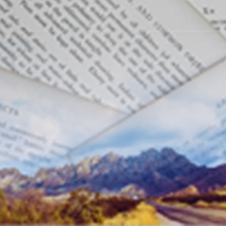 new mexico mountains with image of typed papers overlaid 