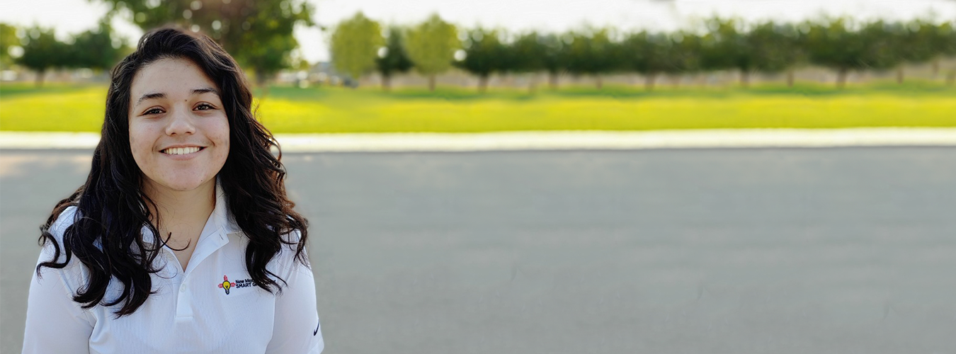 Woman wearing shirt with STEMAP logo